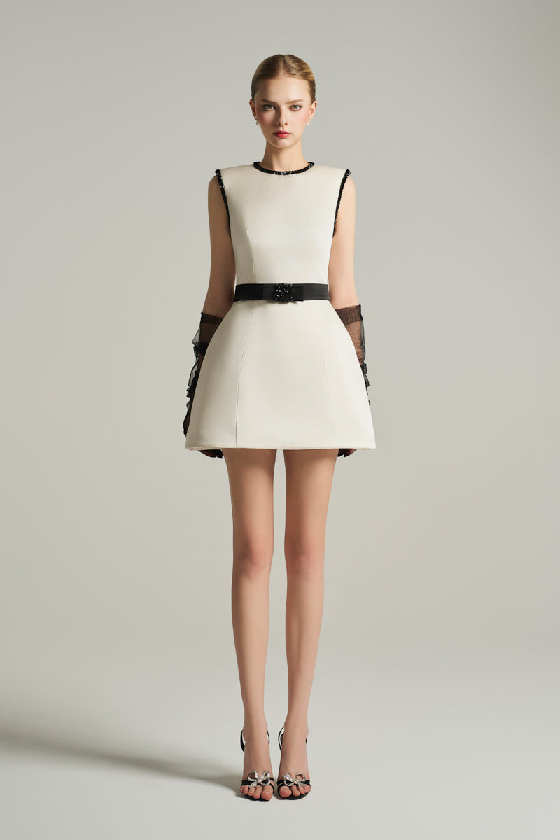 SLEEVELESS BELL MINI DRESS IN IVORY