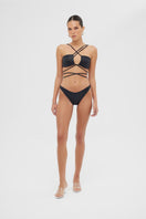 Shiny black Sue bikini set by Maliluha featuring a stylish two-piece swimsuit with a sleek design and minimal detailing.