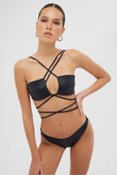 Black Sue bikini set by Maliluha, shiny fabric, with a fitted top and matching bottoms, perfect for swimwear fashion.