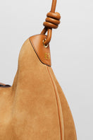 Beige suede boho shoulder bag by Folklore The Label with natural leather straps and bohemian style.
