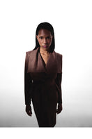 Brown suede mini trench jacket by Kris Marán, shown with classic collar and button details on a neutral background.