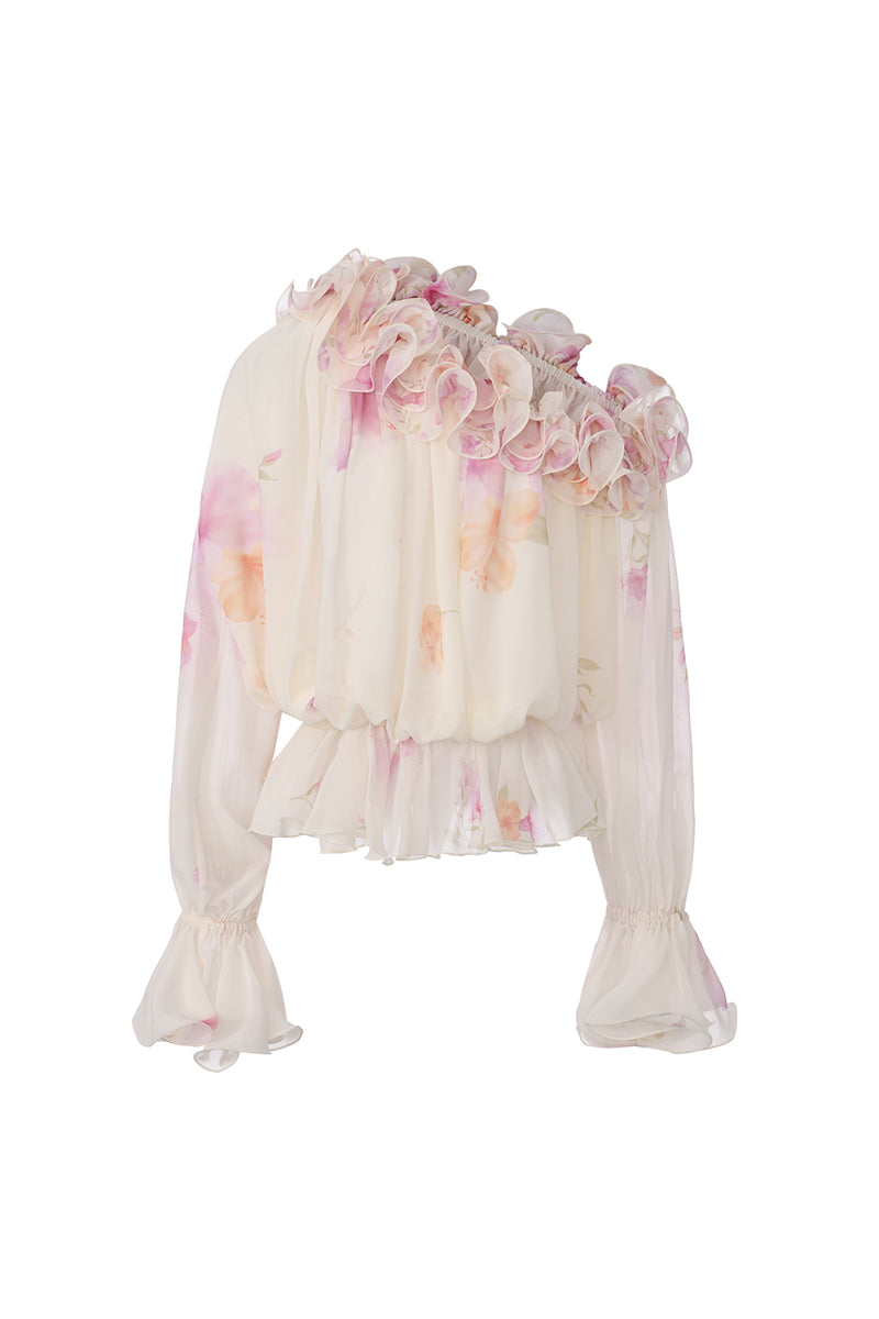 Cream floral summer top with ruffle details from Nana Jacqueline, shown from the front.