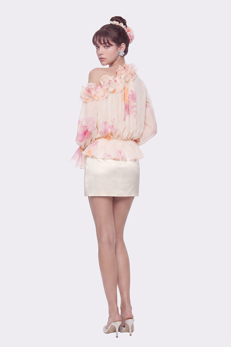 Cream floral summer top by Nana Jacqueline featuring ruffled design and lightweight fabric, perfect for warm weather.
