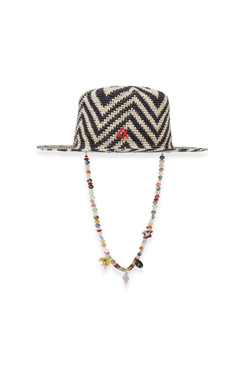 Ser Sun Riddle hat, stylish wide-brim sun hat in natural straw material with adjustable chin strap, perfect for outdoor sun protection.