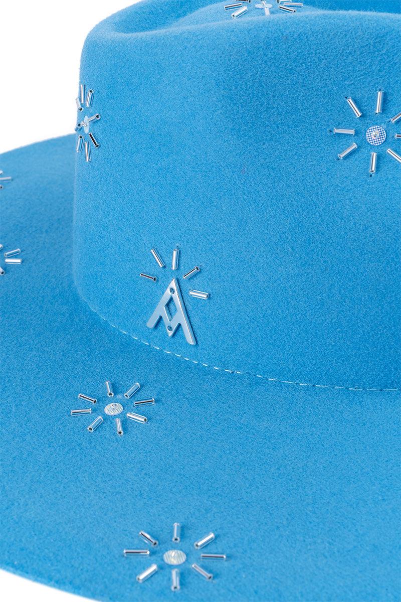 Ser Sunbeam hat in natural straw with wide brim, perfect for sun protection and stylish outdoor wear.