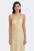 Yellow lace maxi dress by Stolen Stores featuring a slip design and elegant, flowing silhouette.
