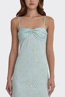 Dusty blue Swan Maxi Slip Lace Dress by Stolen Stores, featuring a sleek neckline and elegant flowing design.
