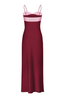 Back view of Stolen Stores Swan Slip Maxi Dress in burgundy and pink, flowing fabric and sleeveless design.