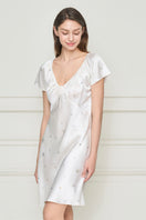 Beige silk nightgown for women from MANITO, featuring a soft, flowing fabric and elegant design perfect for comfortable sleep.