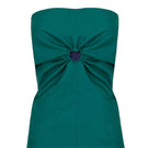 Green faux leather gathered top by JC Pajares, featuring a fitted design with gathered detailing and long sleeves.