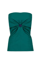 Green faux leather gathered top by JC Pajares, featuring a fitted design with gathered detailing and long sleeves.