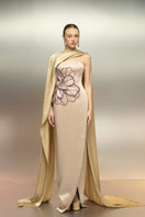 Beige SABBARA Silk Taffeta gown by 21Six with elegant draping and a flowing silhouette, perfect for formal occasions.
