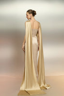 Beige SABBARA silk taffeta gown by 21Six showcasing elegant fabric and flowing design, perfect for formal occasions.