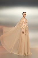 Beige RUMRAM tulle flower gown by 21Six with delicate floral details and elegant flowing fabric.