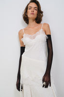Tagg jacquard camisole shirt with delicate lace trim, featuring intricate fabric patterns and a stylish, feminine design.