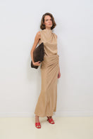 TAGG wrapped midi skirt in soft fabric, featuring a stylish maxi length and elegant design for versatile wear.