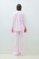 Pink TAGG pants with an elastic waistband, comfortable casual pants with relaxed fit and soft fabric.