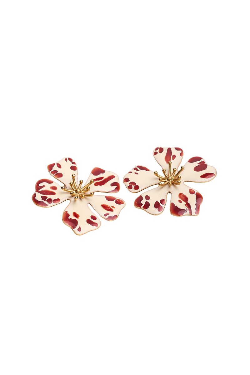 Sara & Flora Butter Aurora Maxi Earrings featuring large, elegant gold-toned earrings with intricate detailing.