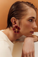 Sara & Flora terracotta Aurora maxi earrings featuring bold, handcrafted orange and red bead accents on gold-toned hooks.