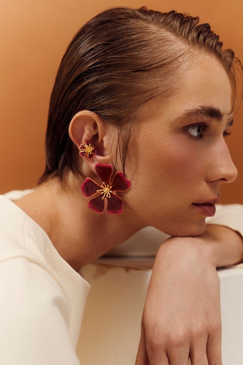 Sara & Flora terracotta Aurora maxi earrings featuring bold, handcrafted orange and red bead accents on gold-toned hooks.