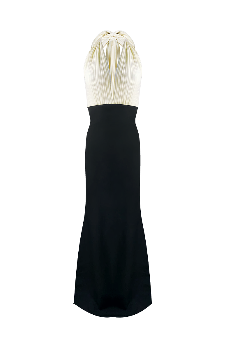 Maylé Vásquez Chavon black and white gown with elegant design, featuring a flowing silhouette and stylish details.