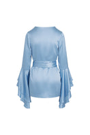 Scarlett Gasque The Darling Robe in blue with ghost back design, soft fabric, and relaxed fit, displayed hanging on a hook.