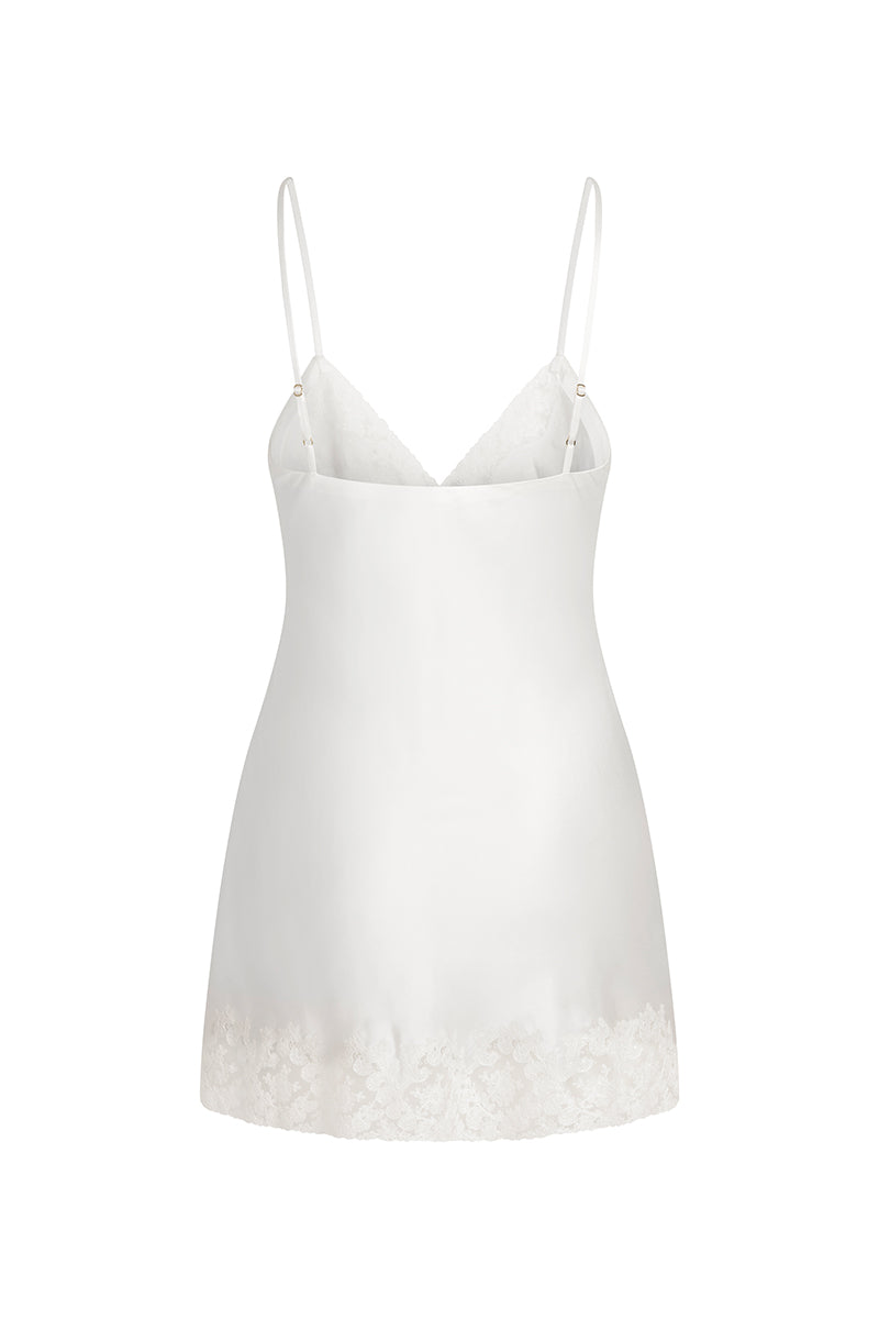Ivory The Jayne Slip mini dress by Scarlett Gasque, featuring a sleek silhouette and elegant design, shown from the back.