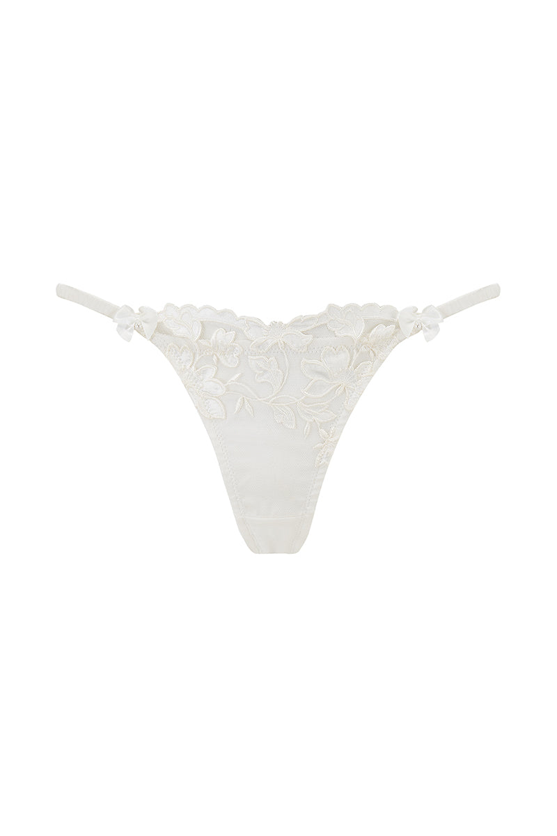 White Scarlett Gasque Velma Thong underwear with ghost front design, showcasing smooth fabric and minimal coverage.