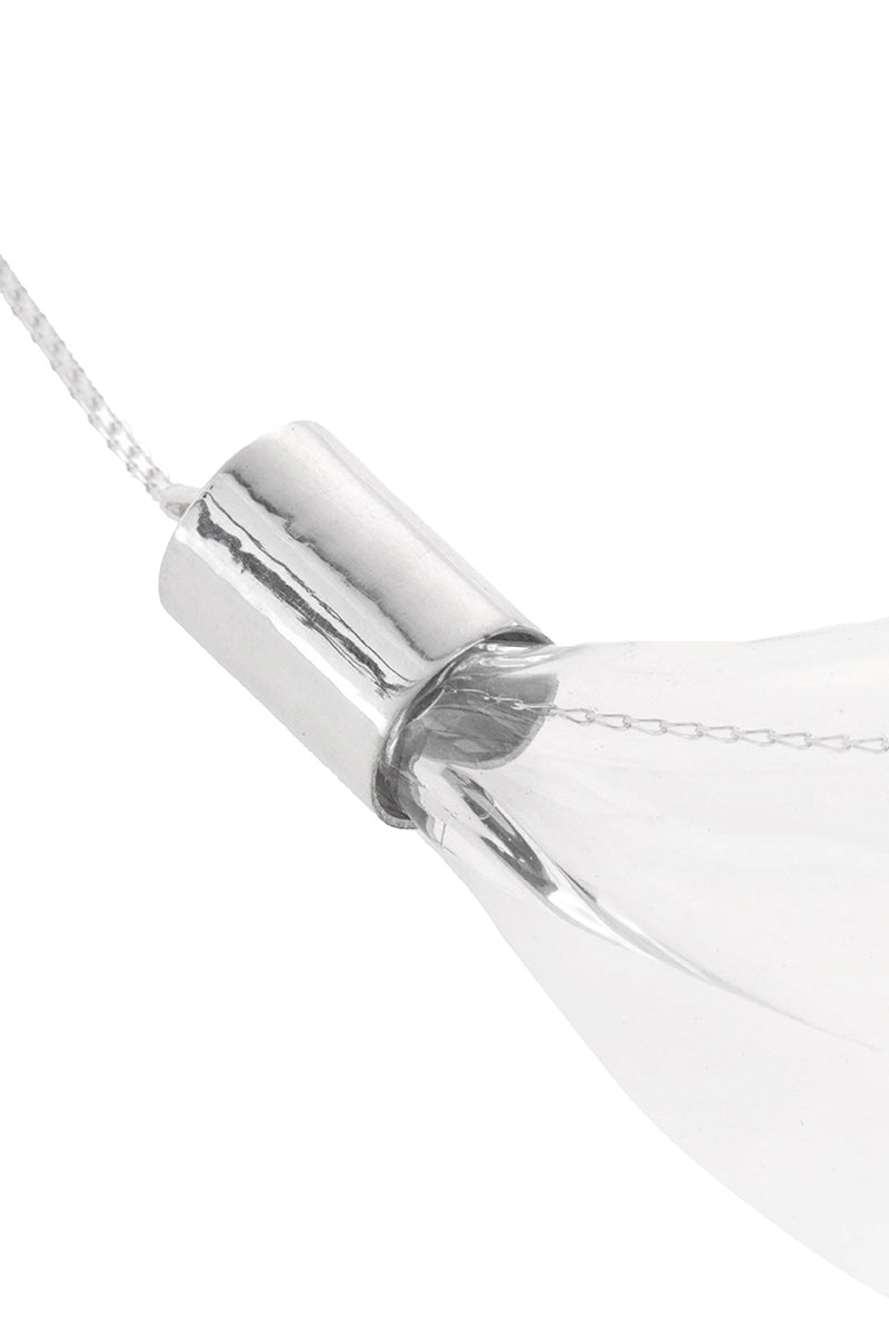 Thick glass choker necklace by MAZ Manuela Álvarez featuring a bold, transparent glass design on a sleek black cord.