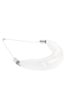 Close-up of a thick glass choker necklace by MAZ Manuela Álvarez featuring a bold, transparent glass design on a neutral background.