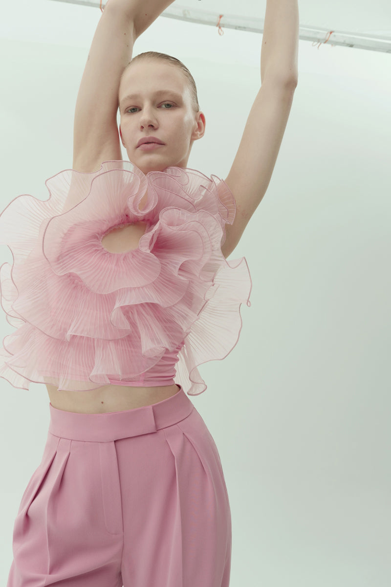 Nadya Dzyak taupe pink one-shoulder translucent flower blouse worn by a model, showcasing elegant design and floral details.