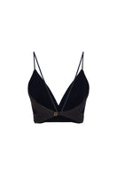 DUMA&CO NODO TOP in black, stylish sleeveless blouse with a relaxed fit, displayed on a mannequin.