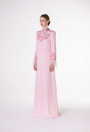 Pink long sleeve velvet satin gown by Tracy Studio, elegant dress with a smooth, shiny fabric and flowing silhouette.