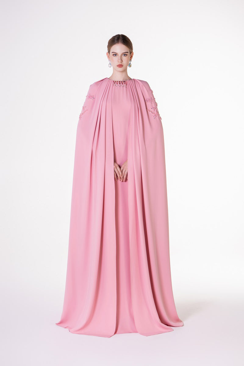 Pink velvet satin cape dress by Tracy Studio, featuring a flowing maxi dress design with elegant fabric and detailed finish.