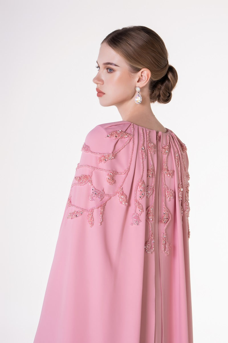 Pink velvet satin cape dress by Tracy Studio, maxi length with flowing fabric and elegant design, perfect for formal occasions.