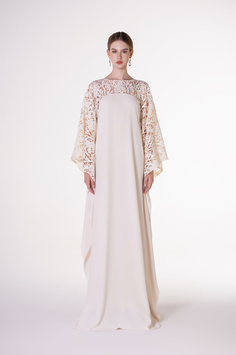 Off-white satin maxi dress with floral sleeve details from Tracy Studio, elegant and flowing with a sophisticated design.