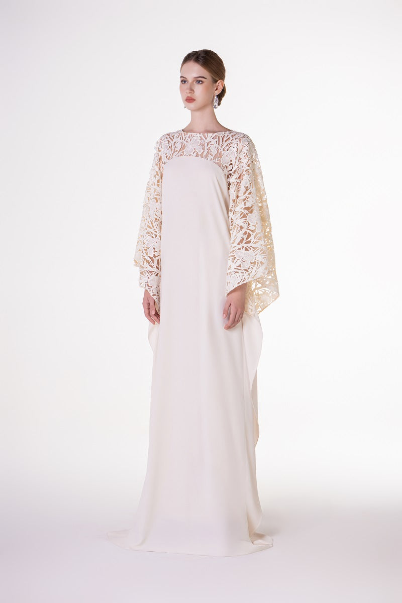 Off-white satin maxi dress with floral sleeves from Tracy Studio, featuring a flowing silhouette and elegant design.