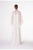 Off-white satin gown with floral sleeve details by Tracy Studio, elegant evening dress featuring a smooth, shiny fabric and delicate floral accents.