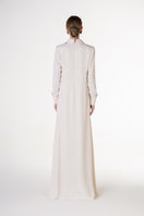 White V-neck satin maxi dress by Tracy Studio, featuring a flowing design and elegant fabric for formal or evening wear.