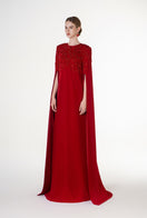 Red velvet satin gown with a round neckline from Tracy Studio, featuring a flowing design perfect for elegant occasions.