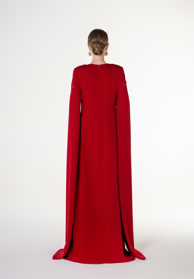 Red velvet satin maxi dress with a round neck from Tracy Studio, featuring a flowing, elegant silhouette.