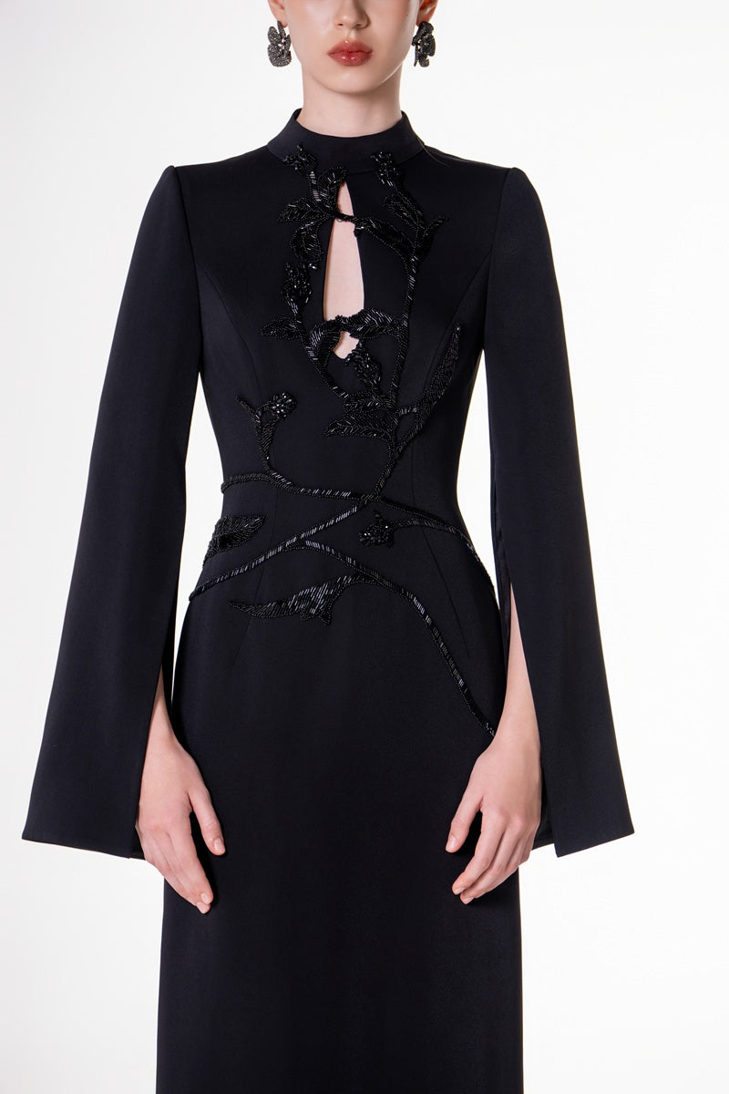 Black velvet satin floor-length maxi dress by Tracy Studio, featuring elegant flowing fabric and a sophisticated silhouette.