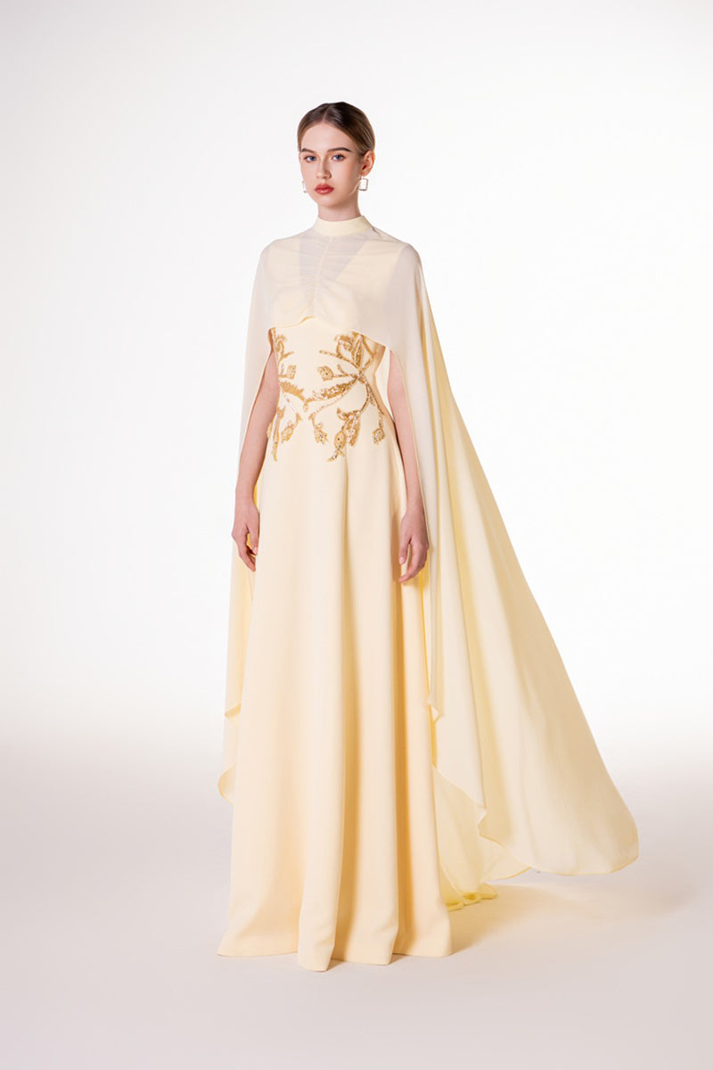Yellow viscose maxi dress with embellished waist detail by Tracy Studio, featuring a matte finish perfect for elegant occasions.