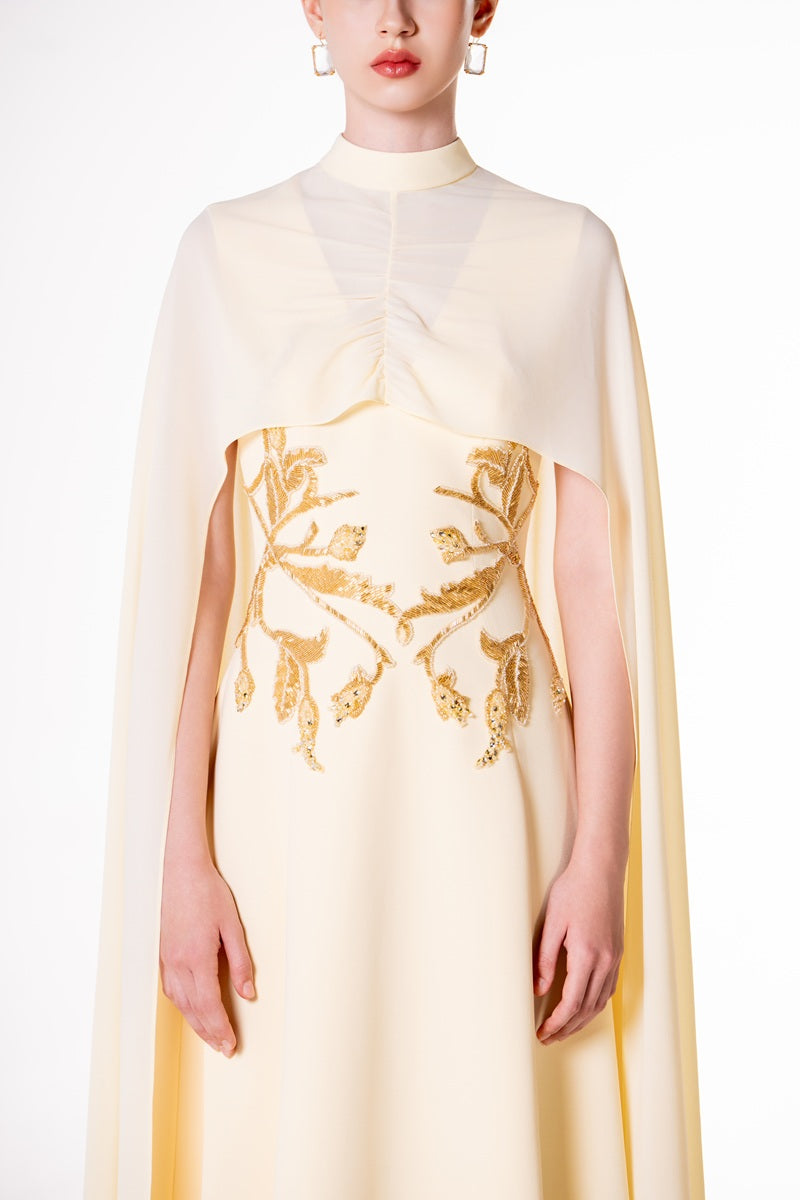 Yellow viscose matte embellished waist maxi dress by Tracy Studio, featuring a flowing silhouette and intricate decorative details.