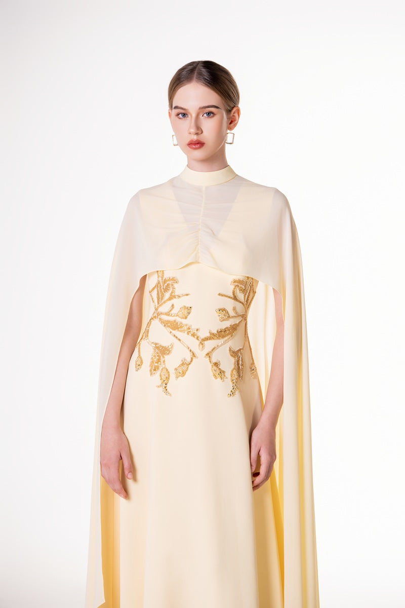 Yellow viscose matte embellished waist maxi dress by Tracy Studio, featuring a flowing silhouette and intricate waist detailing.