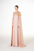 Apricot velvet satin gown by Tracy Studio, elegant dress with a flowing silhouette and soft fabric texture.