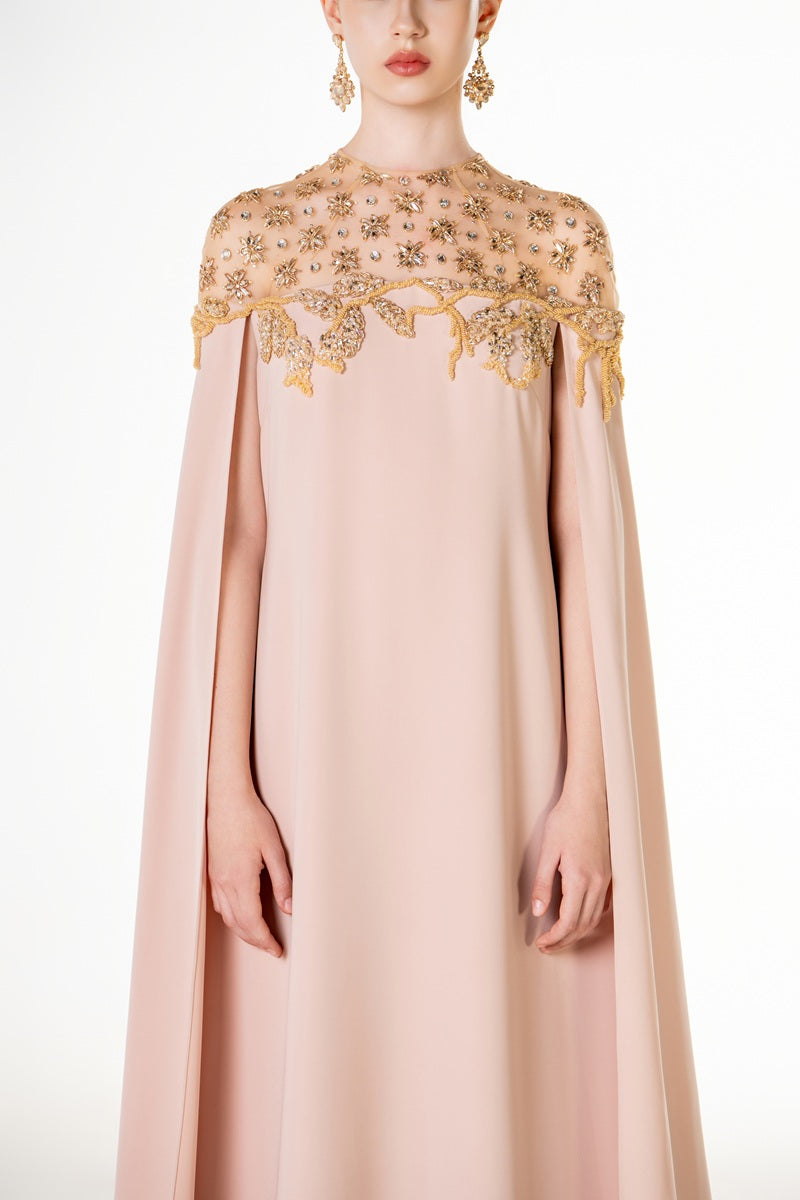 Apricot velvet satin maxi dress by Tracy Studio, featuring a flowing silhouette and elegant design.