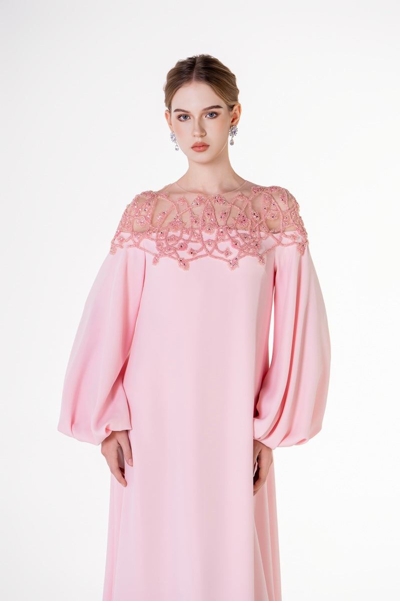 Pink velvet satin maxi dress with puffy sleeves by Tracy Studio, featuring elegant drape and luxurious fabric for stylish occasions.