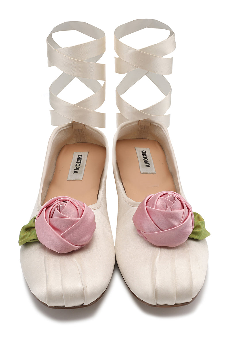 Chictopia satin rose flats in ivory, showcasing elegant slip-on footwear with a satin rose detail on the toe for stylish comfort.