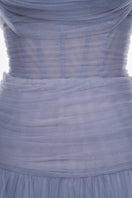 Elegant JOSÉPHINE ELISE gown with flowing fabric and intricate detailing, perfect for formal occasions.